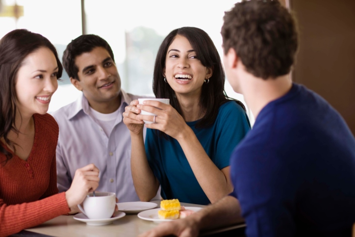 Friends talking in cafe
